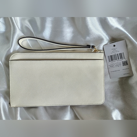 Kate Spade Cream Floral Cutout Wristlet NWT - Picture 2 of 5